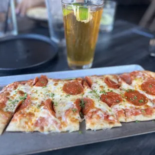 Happy Hour Pepperoni flatbread and an ice cold Modelo
