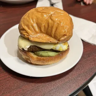 Breakfast sandwich with turkey sausage, egg, avocado and havarti cheese