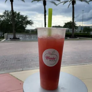 Raspberry green tea with lychee popping pearls