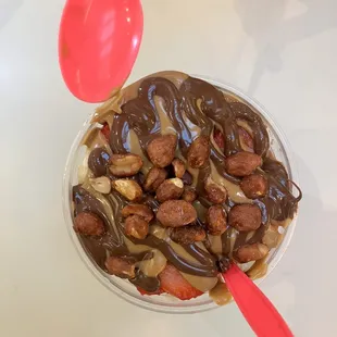 a bowl of food with chocolate and nuts