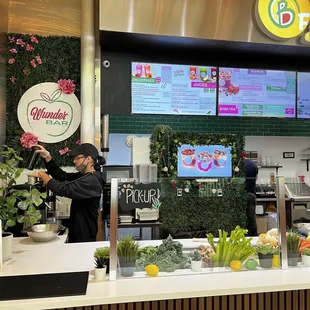 a man preparing food in a restaurant