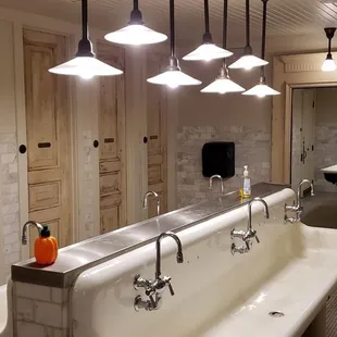 a bathroom with a long bathtub