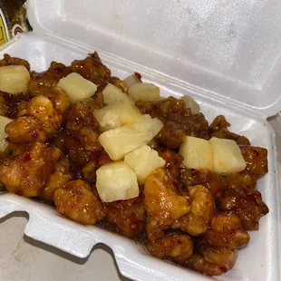 Extremely soggy chewy Sesame Chicken with soggy pineapple chunks for a $1 extra up charge.