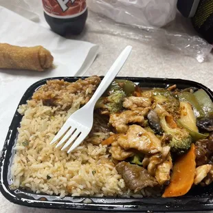 The triple delight with fried rice and egg role