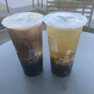 Four season tea with boba, pearl, and coconut jelly. Black tea with fresh milk and boba. Both less ice and 30% sugar.