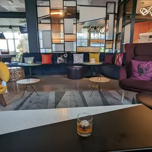 a glass of alcohol on a table