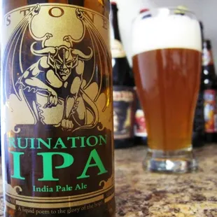 a bottle and a glass of beer