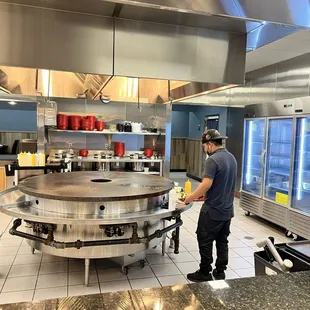 Chef and circular grill