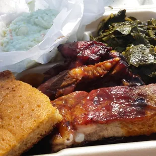 Ribs (with sauce), collards, cole slaw, cornbread