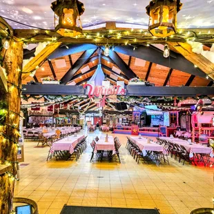During the colder months, we are inside to keep warm. We off a Huge dance floor and plenty of seating.