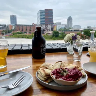 The beet hummus and pita is nice and goes well with a Pilsner. The patio provides a sincere view of downtown Raleigh.