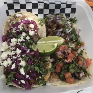 Mini tacos with 4 different meats. Beef, pork, chicken and pork belly. Also the three different styles, Mediterranean, Austin and Wylie.