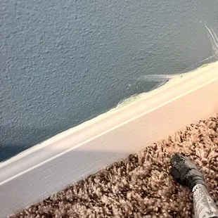 Paint on wall after painting baseboard
