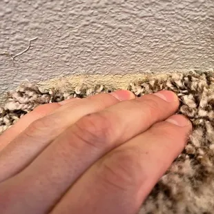 Didn't tape back carpet on stairs.