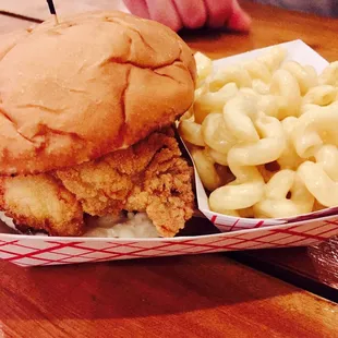 Fried chicken sandwich with a side of mac