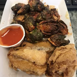 2 piece chicken (breast and thigh) with hot sauce and Korean BBQ brussel sprouts - very very good!