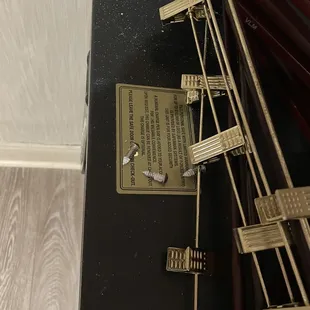 Remnants of the hanger rack that was in the floor