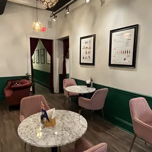 tables, chairs, and artwork