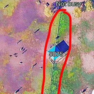 Dividing gate, on the other side is a small dog park on or just open space? Because at the time of this picture it looks empty.