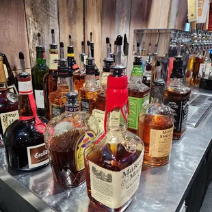 a variety of liquor bottles
