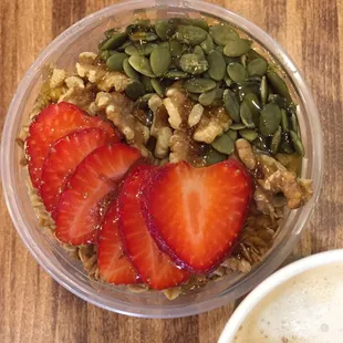 Smoothie bowls in Mango, Acaí, &amp; Pineapple SuperGreen topped with your favorite fruit, nuts &amp; seeds!