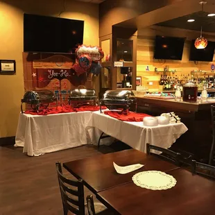 a restaurant with tables and chairs