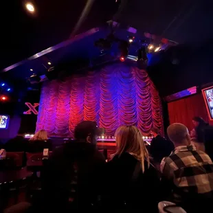 a crowd of people watching a show