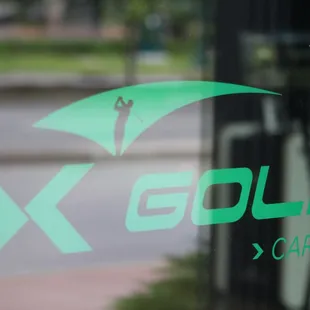 the logo on the glass