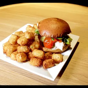 a burger and tater tots
