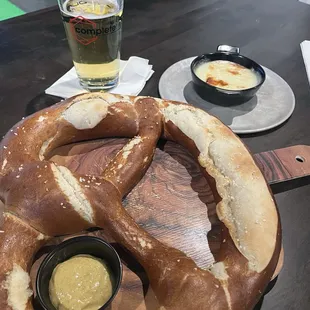 Gigantic pretzel  yeah it's huuuuge. Comes with yummy mustard and queso