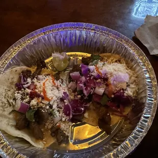 Taco Tuesday cooked on a wood fire with all the accoutrements for you to dress your own tacos