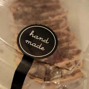 a close up of a sandwich in a plastic container