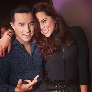 a man and a woman posing for a picture