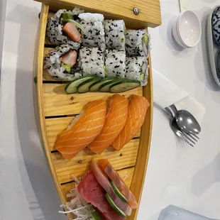 Bangkok combo 1 California role,salmon nigiri, and sashimi