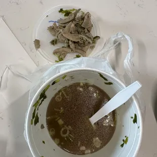 Poured the rest of the broth to see what was at the bottom, found the chicken. Was it dark meat? Not sure. Didn't even want to eat it.