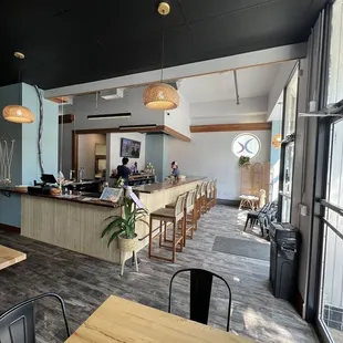 a view of a dining room with a bar