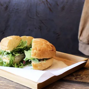 a sandwich on a cutting board