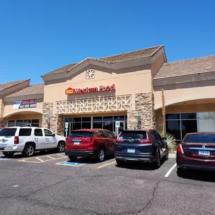 cars parked in front of the store