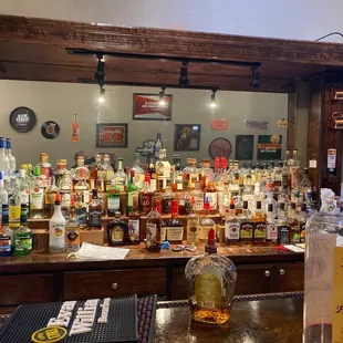 a bar full of liquor bottles