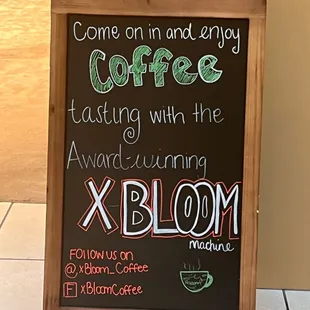a sign for a coffee shop