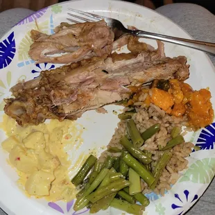 Turkey wings, yams, rice &amp; beans, string beans and potato salad.