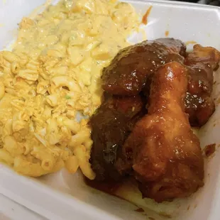 Honey garlic wings with macaroni salad and potatoe salad