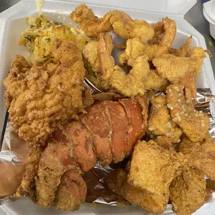Boss plate; Lobster tail, salmon bites, butterflied shrimp