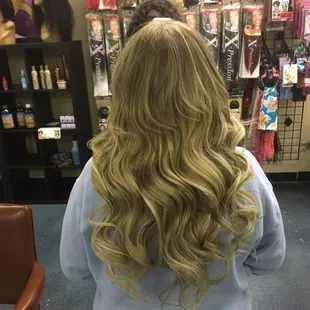 The photo actually makes the look hair darker and more golden. It really is stunning.