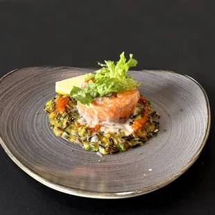 Salmon Tournedos Catalonia, Wild Rice, Mustard Greens, Roasted Bell Pepper-Smoked Pimento Coulis.