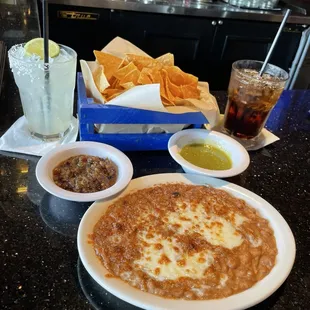 Chips, salsa, &amp; a side of refried beans.