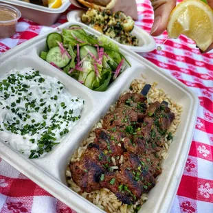 a tray of food on a picnic table