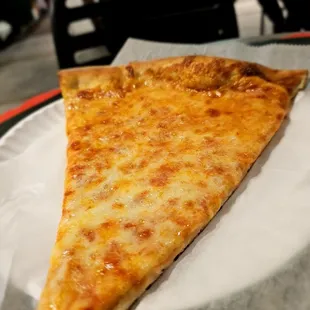 Plain slice. $4.25. It&apos;s a bit pricey but good quality, and it&apos;s midtown east.