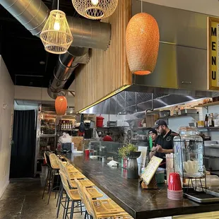 a view of a restaurant counter