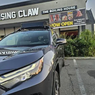 a car parked in front of a building
